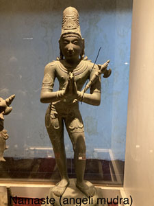 Ancient bronze and stone statues of gods & goddesses in yoga poses